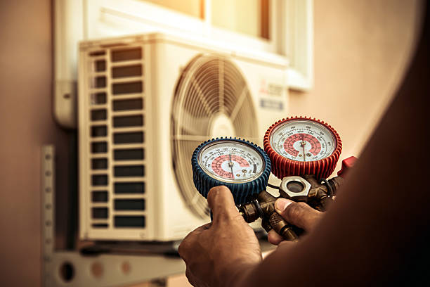 Professional Heat Pump Repair technician working in Icard, NC